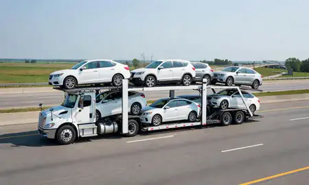 Multi-level car carrier on the highway to Carmel, Indiana, United States