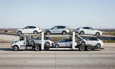 Multi-level car carrier on the highway to Gary, Indiana, United States