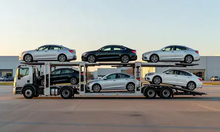Car transporter parked in an industrial area of Jeffersonville, Indiana, United States