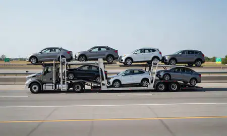 Multi-level car carrier on the highway to Lawrence, Indiana, United States