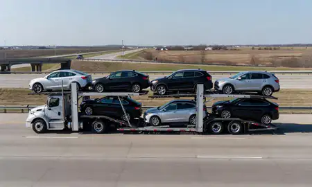 Multi-level car carrier on the highway to Michigan City, Indiana, United States