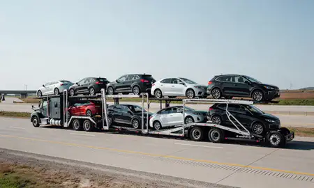 Multi-level car carrier on the highway to Muncie, Indiana, United States