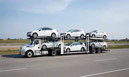 Multi-level car carrier on the highway to Portage, Indiana, United States