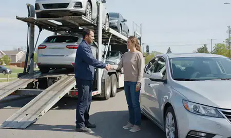 Vehicle owner beside their delivered car in Westfield, Indiana, United States