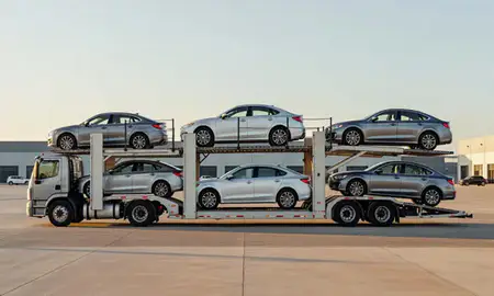 Car transporter parked in an industrial area of Iowa, United States