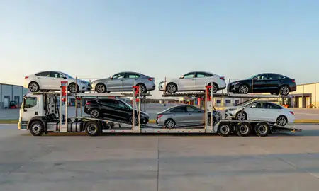 Car transporter parked in an industrial area of Ankeny, Iowa, United States