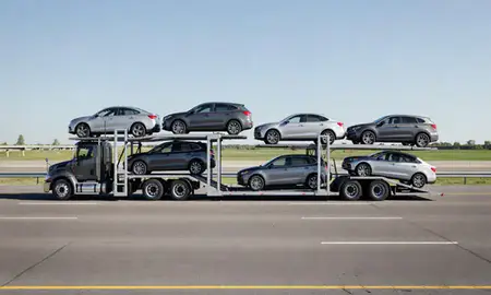 Multi-level car carrier on the highway to Council Bluffs, Iowa, United States