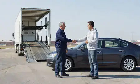 Vehicle owner beside their delivered car in Council Bluffs, Iowa, United States