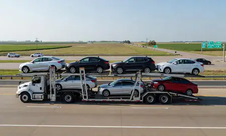 Multi-level car carrier on the highway to Marshalltown, Iowa, United States