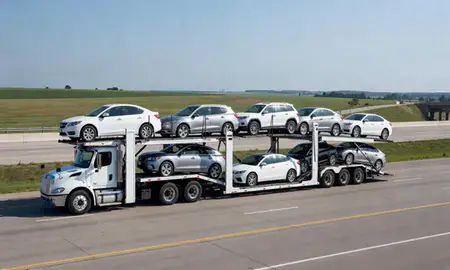 Multi-level car carrier on the highway to North Liberty, Iowa, United States