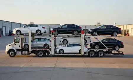 Car transporter parked in an industrial area of Urbandale, Iowa, United States
