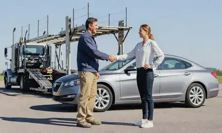 Vehicle owner beside their delivered car in Waukee, Iowa, United States