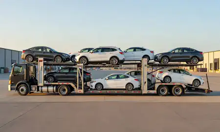 Car transporter parked in an industrial area of Waukee, Iowa, United States