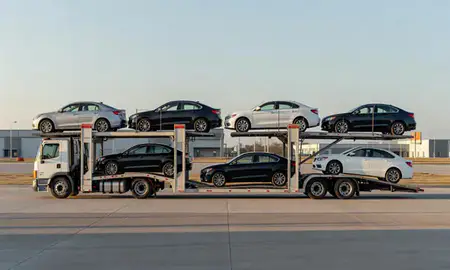 Car transporter parked in an industrial area of Andover, Kansas, United States