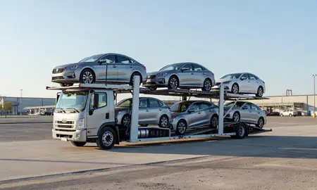 Car transporter loaded with vehicles in Arkansas City, Kansas, United States