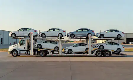 Car transporter parked in an industrial area of Dodge City, Kansas, United States