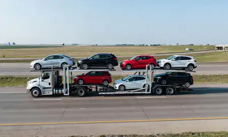 Multi-level car carrier on the highway to Gardner, Kansas, United States