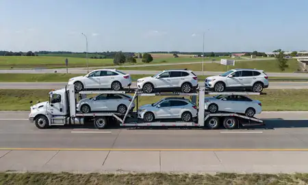 Multi-level car carrier on the highway to Leavenworth, Kansas, United States