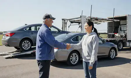 Vehicle owner beside their delivered car in Leavenworth, Kansas, United States