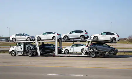 Multi-level car carrier on the highway to Leawood, Kansas, United States