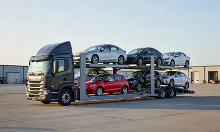 Car transporter loaded with vehicles in Pittsburg, Kansas, United States