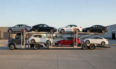 Car transporter parked in an industrial area of Prairie Village, Kansas, United States