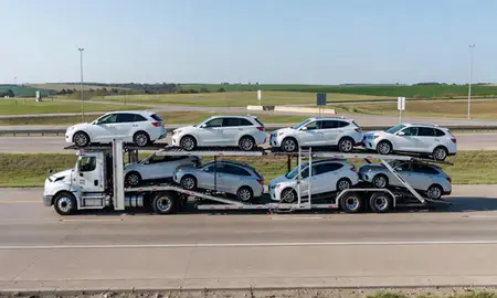Multi-level car carrier on the highway to Shawnee, Kansas, United States