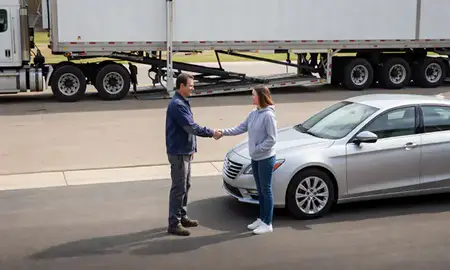 Vehicle owner beside their delivered car in Shawnee, Kansas, United States