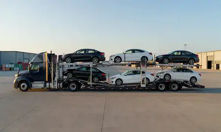 Car transporter parked in an industrial area of Kentucky, United States
