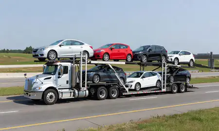 Multi-level car carrier on the highway to Berea, Kentucky, United States