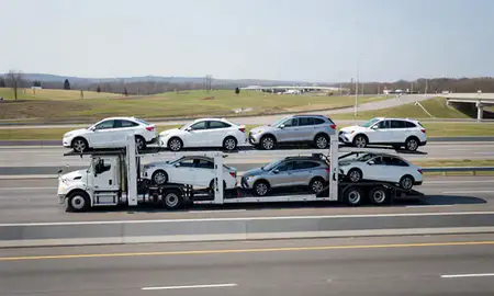 Multi-level car carrier on the highway to Covington, Kentucky, United States