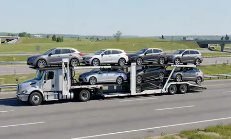 Multi-level car carrier on the highway to Elizabethtown, Kentucky, United States