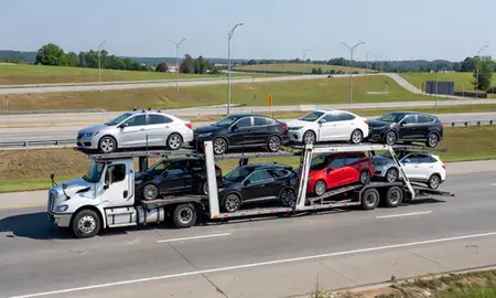 Multi-level car carrier on the highway to Florence, Kentucky, United States