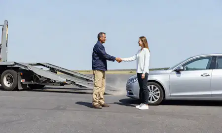 Vehicle owner beside their delivered car in Florence, Kentucky, United States