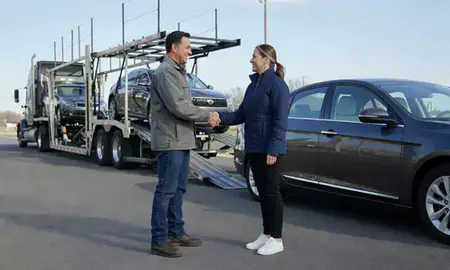 Vehicle owner beside their delivered car in Frankfort, Kentucky, United States