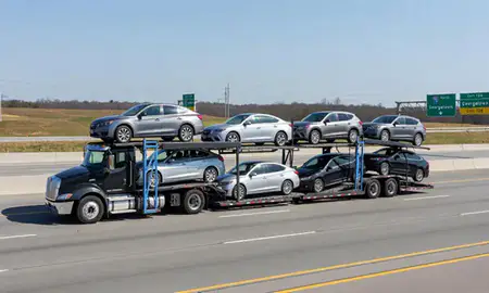 Multi-level car carrier on the highway to Georgetown, Kentucky, United States