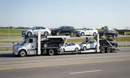 Multi-level car carrier on the highway to Independence, Kentucky, United States