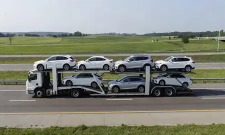Multi-level car carrier on the highway to Lexington, Kentucky, United States