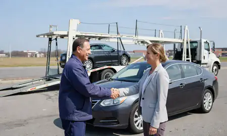 Vehicle owner beside their delivered car in Lexington, Kentucky, United States