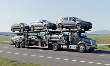 Multi-level car carrier on the highway to Mount Washington, Kentucky, United States