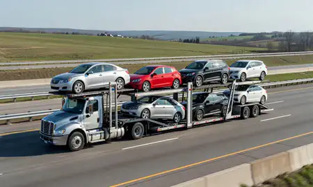 Multi-level car carrier on the highway to Shelbyville, Kentucky, United States