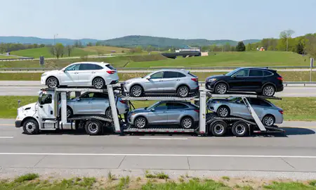 Multi-level car carrier on the highway to St. Matthews, Kentucky, United States
