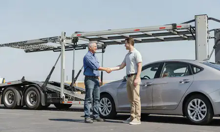 Vehicle owner beside their delivered car in St. Matthews, Kentucky, United States