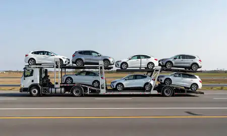 Multi-level car carrier on the highway to Bayou Cane, Louisiana, United States