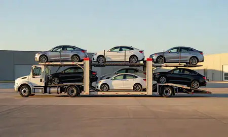 Car transporter parked in an industrial area of Estelle, Louisiana, United States