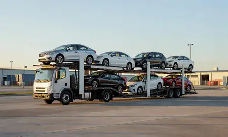 Car transporter loaded with vehicles in Mandeville, Louisiana, United States
