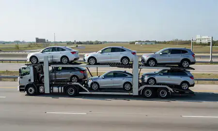 Multi-level car carrier on the highway to New Iberia, Louisiana, United States