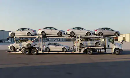 Car transporter parked in an industrial area of New Iberia, Louisiana, United States