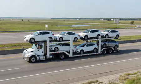 Multi-level car carrier on the highway to Slidell, Louisiana, United States