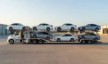 Car transporter parked in an industrial area of Zachary, Louisiana, United States